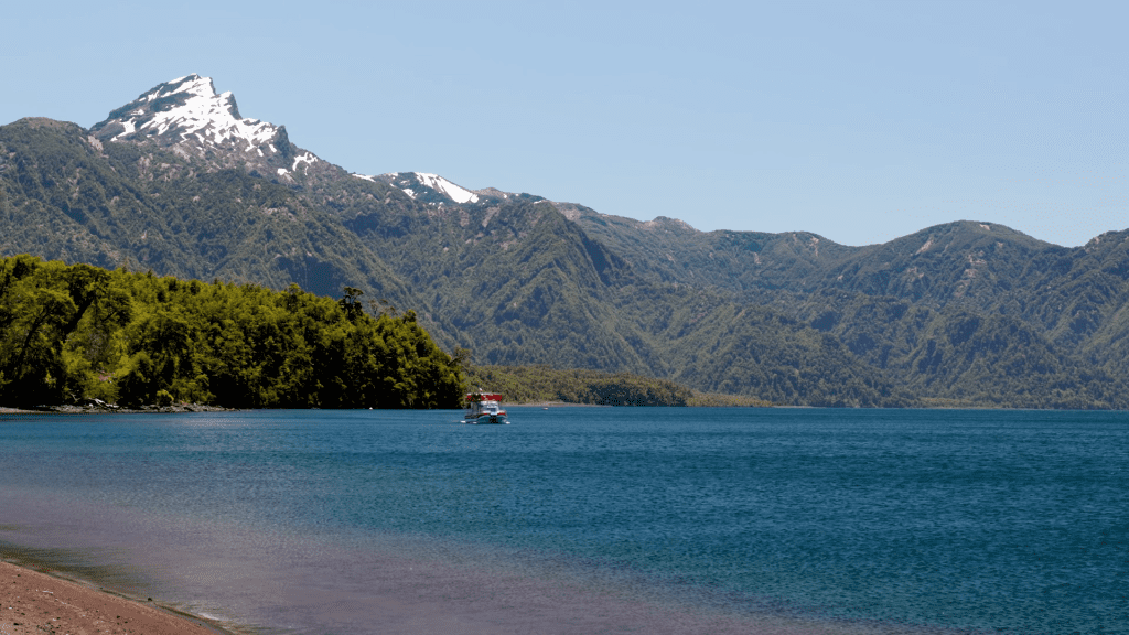 Todos Los Santos Lake reflecting majestic mountains in Chile