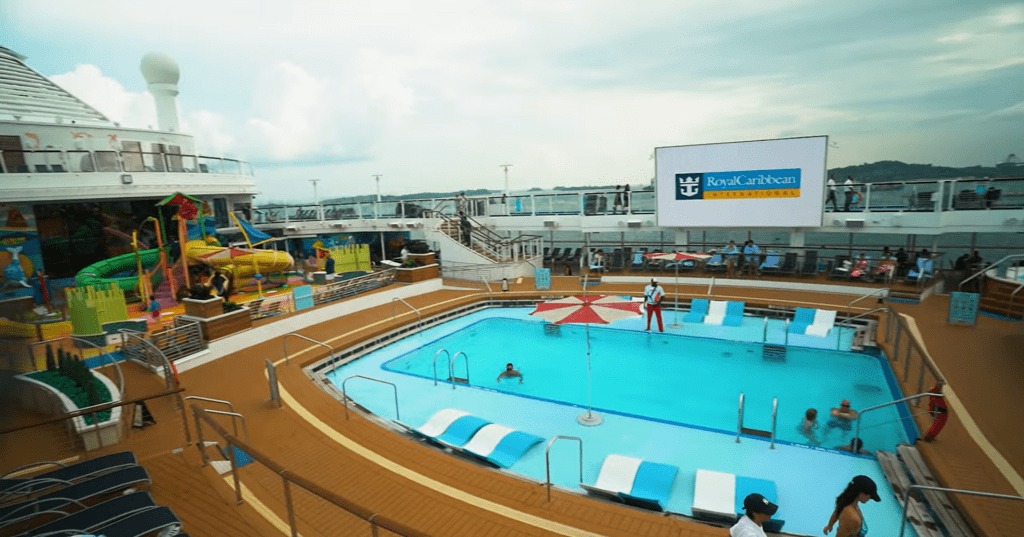 Outdoor movie area with a pool on Royal Caribbean’s Spectrum of the Seas.