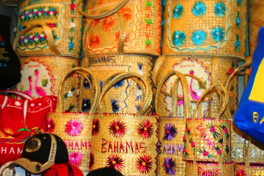 Vibrant market stalls at Nassau’s Straw Market, showcasing a variety of handmade Bahamian crafts and souvenirs.