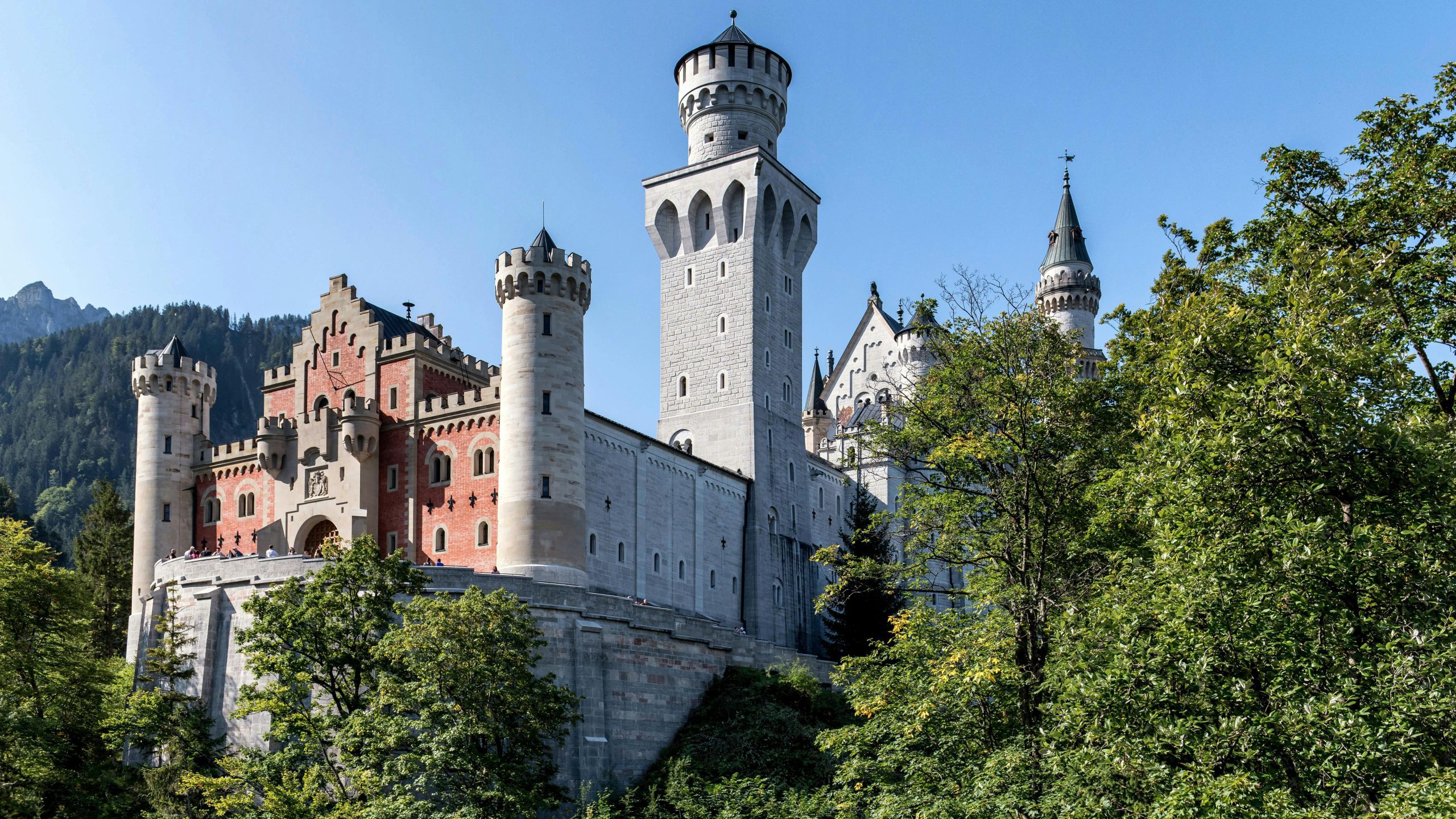 Majestic view of Schloss Neuschwanstein, a fairytale castle nestled in the Bavarian Alps.