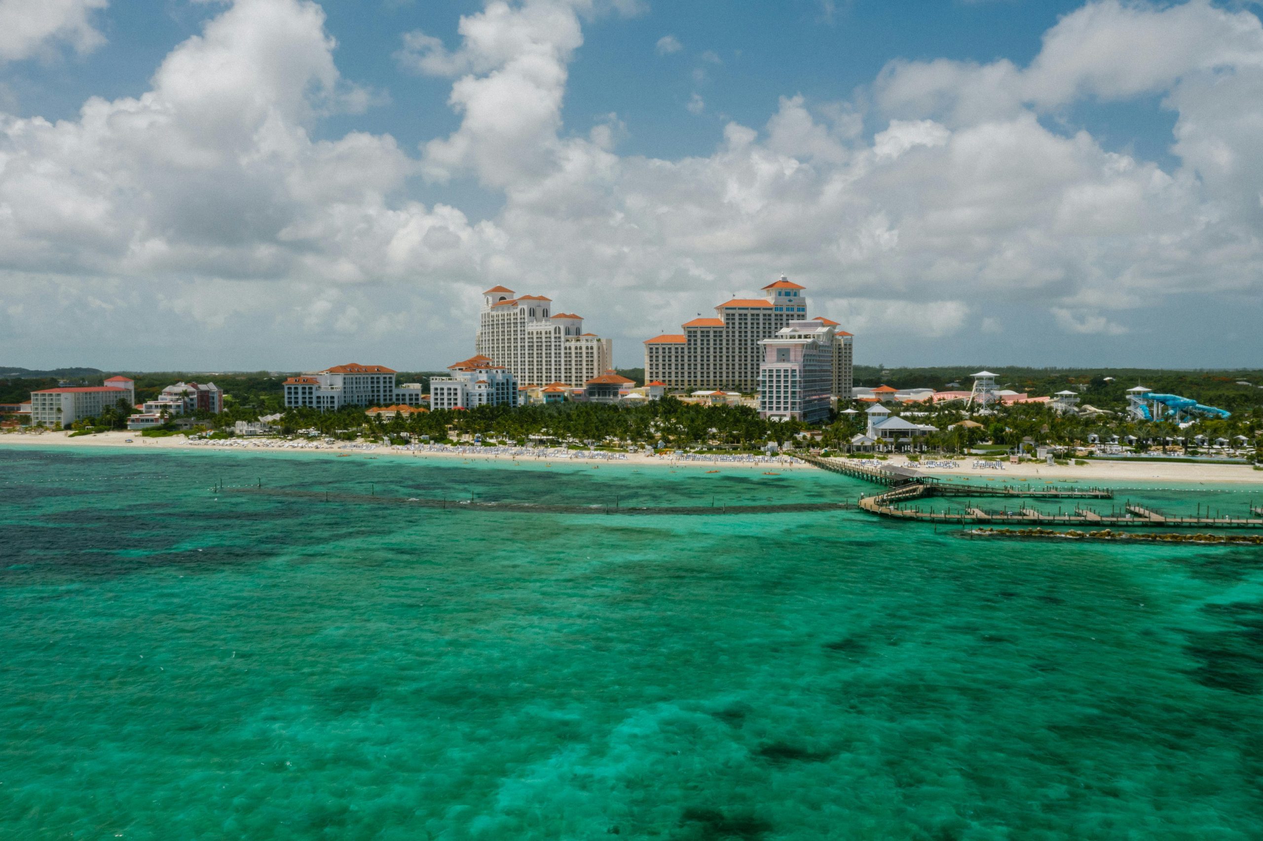 Aerial view of Nassau coastline with Baha Mar Resort and turquoise sea.